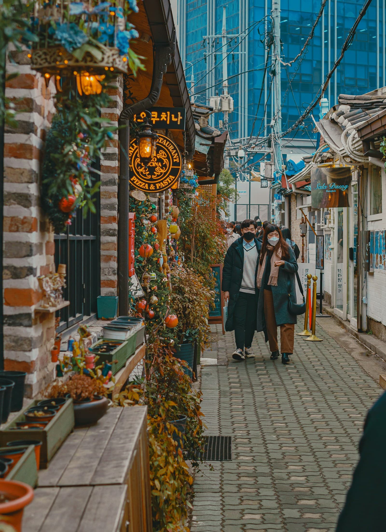 Stylish couple standing together on a city sidewalk