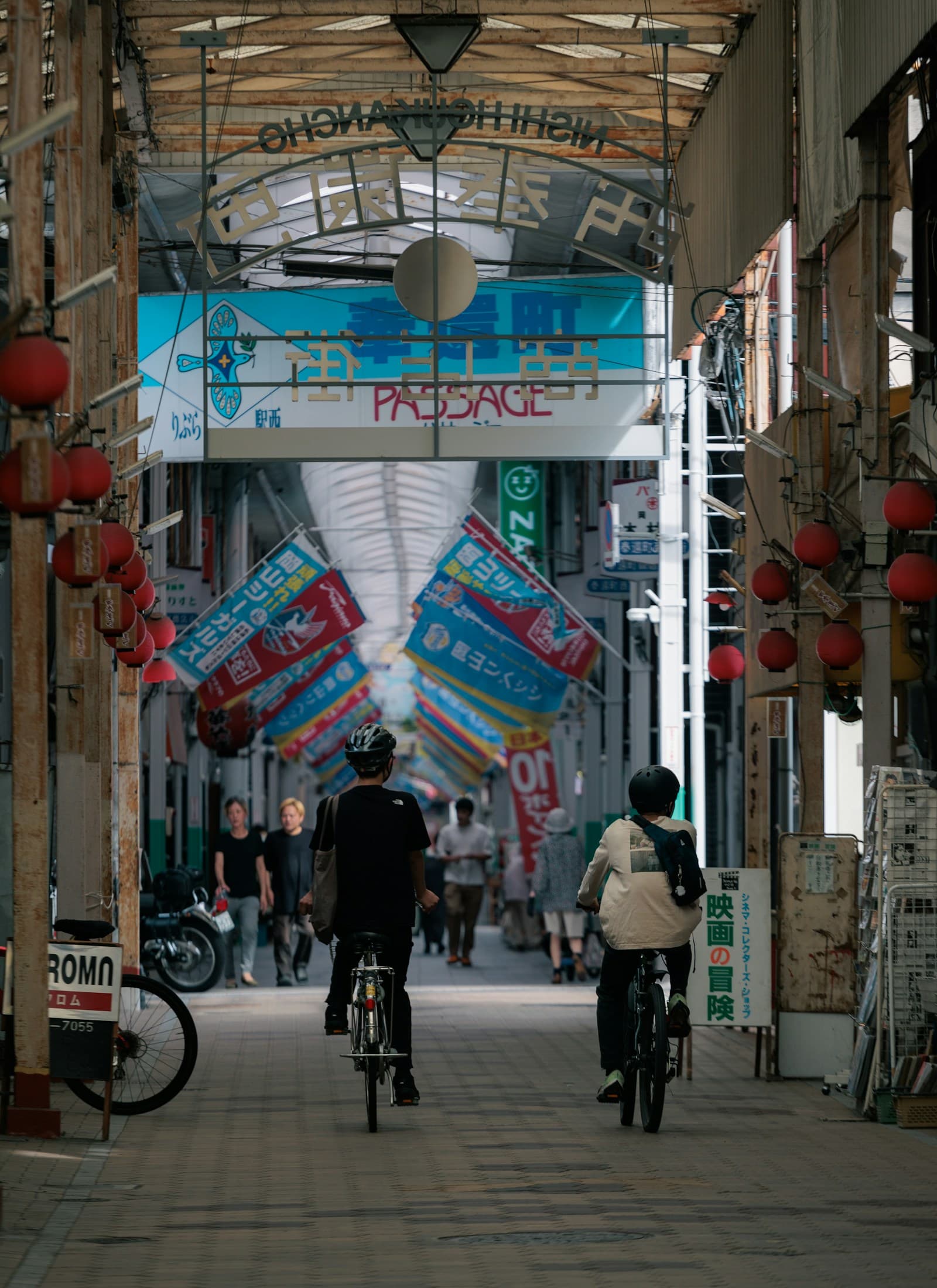Couple riding bikes through the city